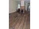Spacious living room with red brick fireplace and hardwood floors at 1839 Lakewood Se Ave, Atlanta, GA 30315