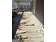 A spacious front porch with wood flooring and railing at 1839 Lakewood Se Ave, Atlanta, GA 30315