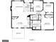 Floor plan highlighting the layout of the living room, bedrooms, bathrooms, and kitchen on the first floor at 15 Huntington Dr, Grantville, GA 30220