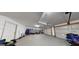 Spacious garage with ample room for storage and parking, including a motorcycle at 15 Huntington Dr, Grantville, GA 30220