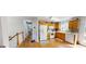Bright kitchen featuring wood cabinets, stainless steel appliances, and hardwood floors at 15 Huntington Dr, Grantville, GA 30220