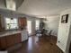 Kitchen with oak cabinetry, appliances, and an adjacent dining area at 15 Huntington Dr, Grantville, GA 30220