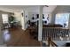 Open concept living room and dining area with hardwood floors at 15 Huntington Dr, Grantville, GA 30220
