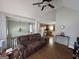 Open-concept living room leading to the kitchen and dining area at 15 Huntington Dr, Grantville, GA 30220