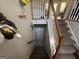 Staircase leading to the lower level, with access to storage at 15 Huntington Dr, Grantville, GA 30220