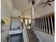 Staircase with railing leading to the lower level of the home at 15 Huntington Dr, Grantville, GA 30220