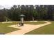 Outdoor fitness area with multiple exercise stations and walking path at 12046 Conrad Cir # 100, Hampton, GA 30228