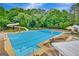 Resort-style pool with waterslide and lounge chairs at 803 Natchez Ct, Peachtree City, GA 30269