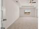 Spacious bedroom with neutral carpeting and large window at 12116 Conrad Cir # 114, Hampton, GA 30228