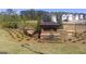 Shoal Creek community entrance with landscaping and signage at 12116 Conrad Cir # 114, Hampton, GA 30228