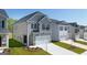 Two-story house with gray siding, and a two-car garage at 12116 Conrad Cir # 114, Hampton, GA 30228