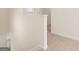 Upstairs hallway with carpeted floor at 12116 Conrad Cir # 114, Hampton, GA 30228