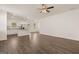 Open concept kitchen and living room with hardwood floors at 12116 Conrad Cir # 114, Hampton, GA 30228
