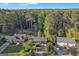 Aerial view of the homes and their surrounding lots, located in a wooded neighborhood at 2145 Sandgate Cir, South Fulton, GA 30349