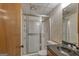 Bathroom with glass-doored shower at 2145 Sandgate Cir, South Fulton, GA 30349