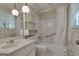 Bathroom with built in shelves and a shower and tub at 2145 Sandgate Cir, South Fulton, GA 30349