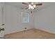 Carpeted bedroom with a window, ceiling fan with lighting, and a closet at 2145 Sandgate Cir, South Fulton, GA 30349