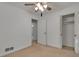Bedroom featuring carpet, a ceiling fan and an open closet for storage at 2145 Sandgate Cir, South Fulton, GA 30349