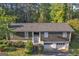 Two story home with attached garage and beautiful landscaping at 2145 Sandgate Cir, South Fulton, GA 30349