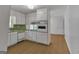 Kitchen with white cabinets and retro appliances at 2145 Sandgate Cir, South Fulton, GA 30349
