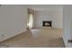Spacious living room with a brick fireplace and large window at 2145 Sandgate Cir, South Fulton, GA 30349