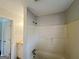 Cozy bathroom featuring a tub shower and vanity with beige tile accents at 422 Windsor Dr, Forest Park, GA 30297