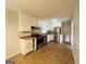 Functional kitchen with stainless steel appliances, white cabinets, and neutral countertops at 422 Windsor Dr, Forest Park, GA 30297