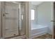 Bathroom with shower and bathtub at 633 Mill Creek Trl, Jonesboro, GA 30238