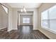 Spacious dining room with hardwood floors and large windows at 633 Mill Creek Trl, Jonesboro, GA 30238