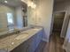 Main bathroom with double vanity and walk-in closet at 746 S. Bethany Rd., Locust Grove, GA 30248