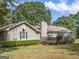 Home exterior showing an outdoor deck and mature hedges at 950 Old Jackson Rd, Locust Grove, GA 30248