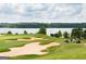 Golf course with sand traps and lake view at 976 Buckhorn Bnd, Locust Grove, GA 30248