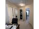 Hallway with neutral colors and carpets leading to bedrooms and closet at 3129 Oak Ridge Ln, Loganville, GA 30052