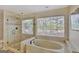 Elegant bathroom with a large shower, garden tub, and updated fixtures at 102 Morallion Hls, Peachtree City, GA 30269