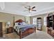 Large main bedroom with a king-size bed and plenty of natural light at 102 Morallion Hls, Peachtree City, GA 30269