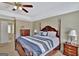 Main bedroom features a king-size bed, and views of the bathroom at 102 Morallion Hls, Peachtree City, GA 30269