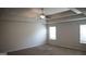 Spacious bedroom with a ceiling fan, neutral walls, and plush carpeting at 12226 Flannery Ln, Hampton, GA 30228