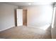 Cozy bedroom with an open closet and ample natural light from the window at 12226 Flannery Ln, Hampton, GA 30228