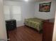 Bedroom with hardwood floors and a double bed at 3248 Brisbane Way, Lithonia, GA 30038