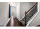 Bright entryway with hardwood floors and staircase at 553 Dasheill Ln, Atlanta, GA 30349