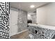 Upper hallway with a unique black and white wall design at 553 Dasheill Ln, Atlanta, GA 30349