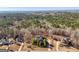 Aerial view of neighborhood and surrounding woods at 811 Somersby Dr, Dallas, GA 30157