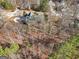 Aerial view of a house surrounded by trees at 811 Somersby Dr, Dallas, GA 30157