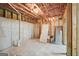 Unfinished basement room with door and framing at 811 Somersby Dr, Dallas, GA 30157