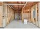 Unfinished basement with water heater and framing at 811 Somersby Dr, Dallas, GA 30157