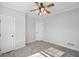 Spacious bedroom with two closets and ceiling fan at 811 Somersby Dr, Dallas, GA 30157