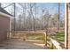 Wooden deck overlooking a wooded backyard at 811 Somersby Dr, Dallas, GA 30157