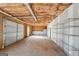 Unfinished garage with shelving and overhead door at 811 Somersby Dr, Dallas, GA 30157