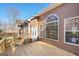 House exterior showcasing a back deck and large windows at 811 Somersby Dr, Dallas, GA 30157