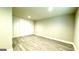 Finished basement offering extra living space with wood-look floors at 1222 Bronx Nw St, Atlanta, GA 30314